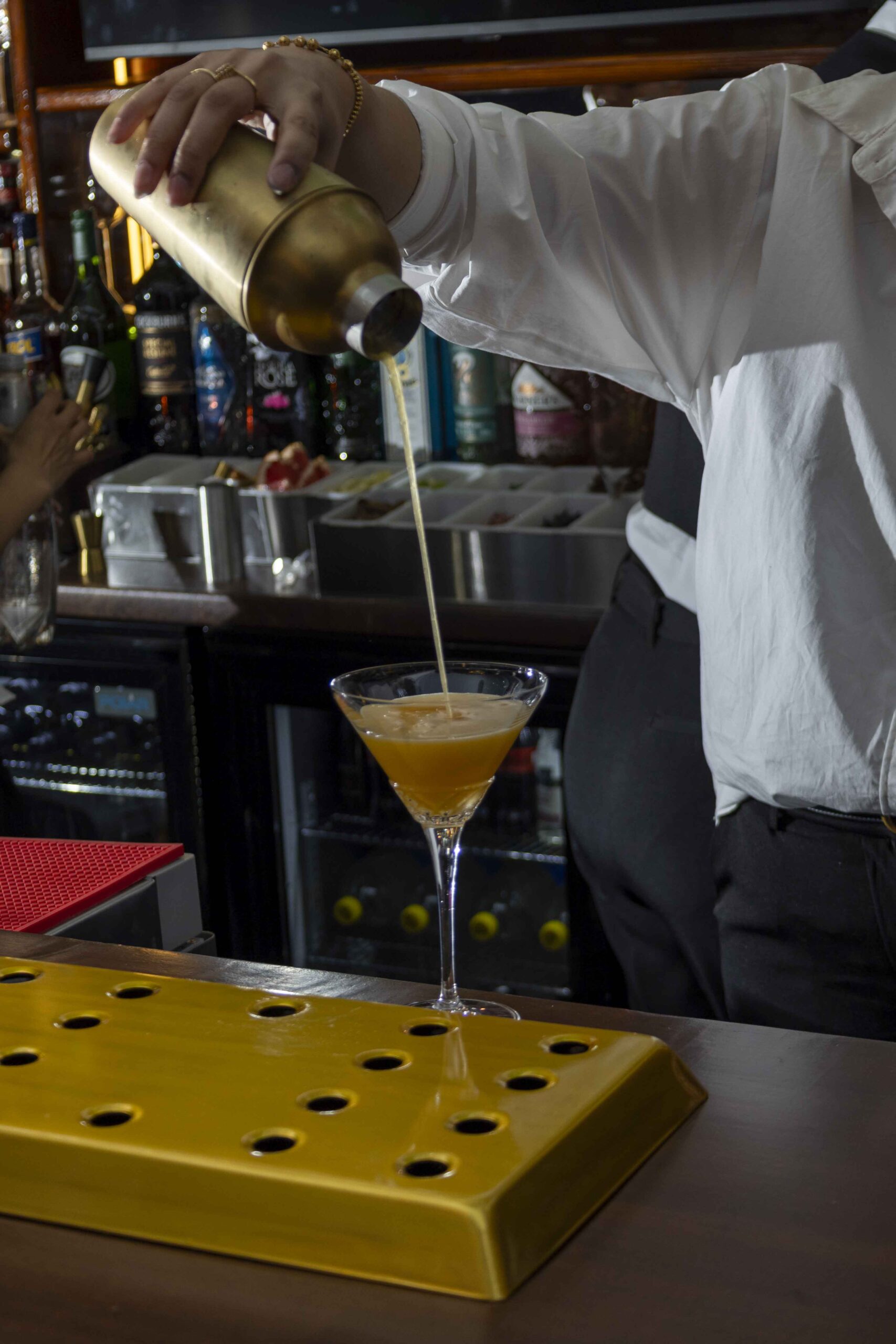 Pornstar Martini being prepared by a bartender at Lasani