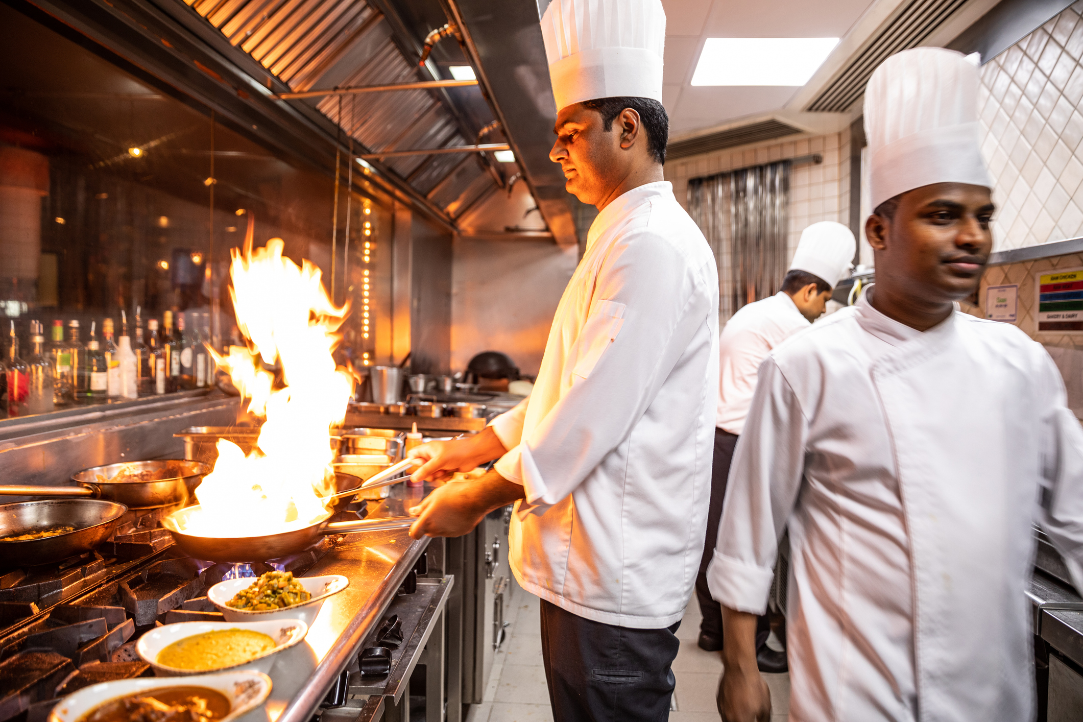 Indian chefs cooking in a professional kitchen